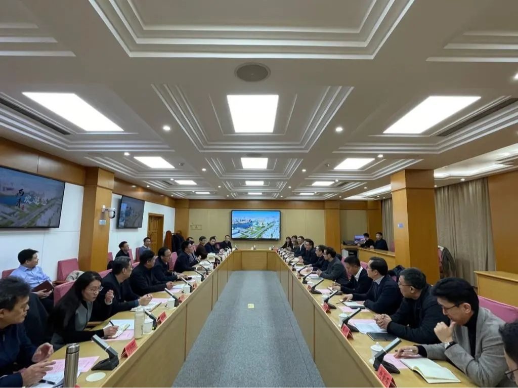 校長練繼建一行到西青區政府交流調研